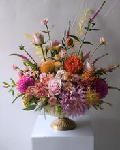 Load image into Gallery viewer, Lavish floral arrangement in gold compote vase