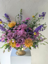 Load image into Gallery viewer, Lavish floral arrangement in gold compote vase