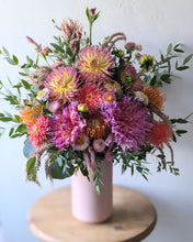 Load image into Gallery viewer, Pretty in Pink floral arrangement in a pink ceramic vase
