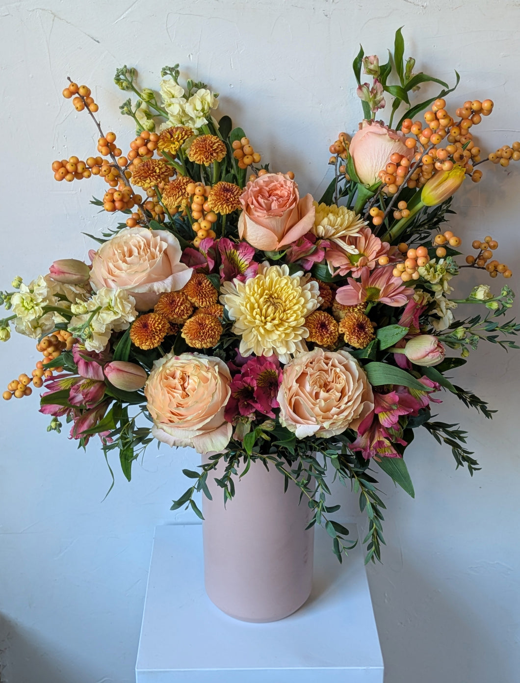 Pretty in Pink floral arrangement in a pink ceramic vase